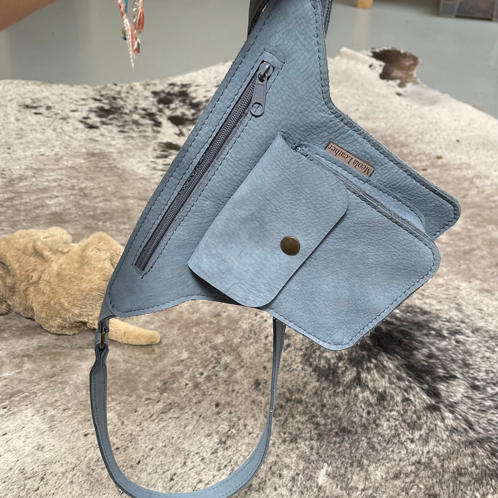 
                      
                        Leren doggybag crossbody of heup uitlaattas
                      
                    