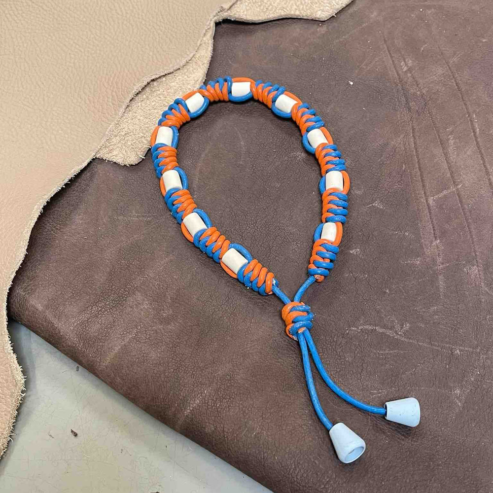 
                      
                        Meola_Leather_dogs_tekenband_vlooienband_natuurlijk_EM_kralen_leer_oranje_blauw-anti-tekenband
                      
                    